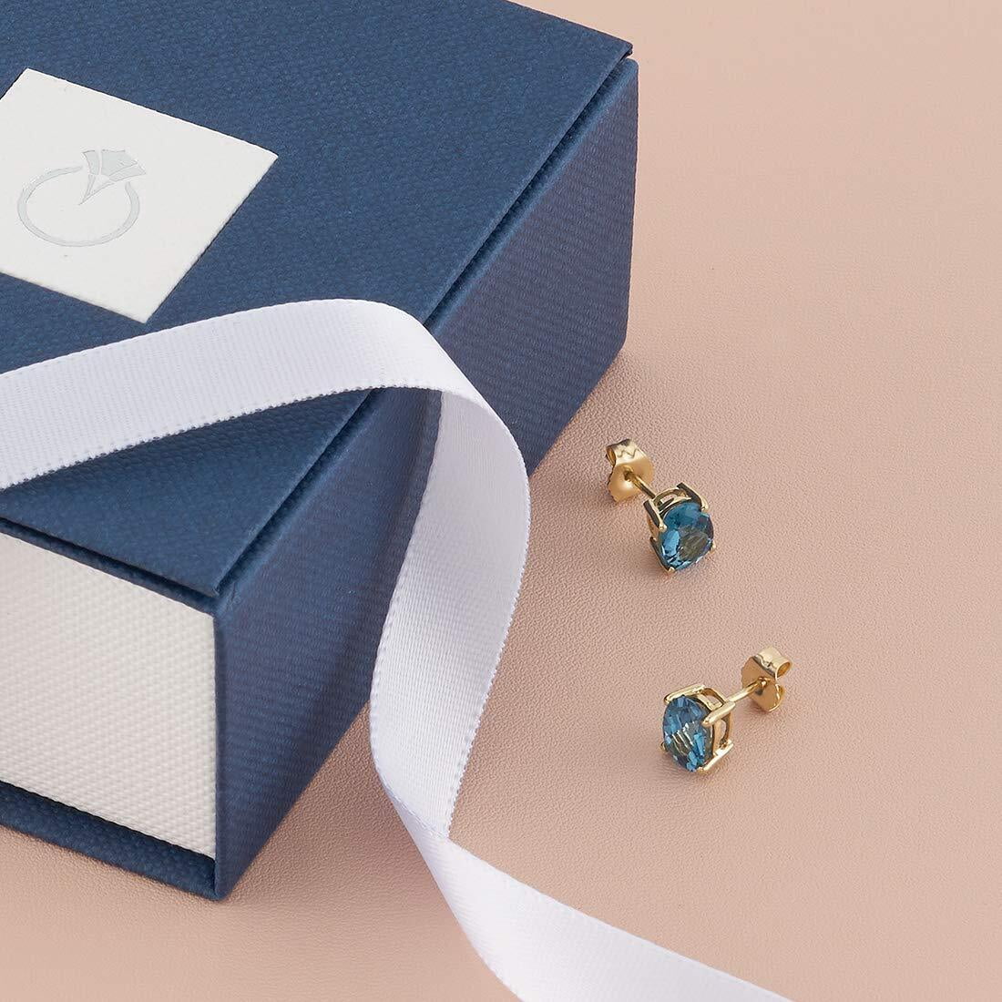 Peora London Blue Topaz Earrings for Women in 14 Karat Yellow Gold, Classic Solitaire Studs, 7x5mm Oval Shape, 2 Carats total, Friction Back