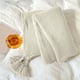 thumbnail image 5 of Manta de acrílico suave de punto con ribete de flecos para sofá, cama o siesta en la oficina – Ligera y fácil de plegar, 5 of 7