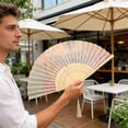 thumbnail image 6 of PoyoKee Hand Fan Foldable, 1Pc Elegant Paper Travel Fan, Lightweight Portable, Travel Essentials for Garden Photography Holidays, Colorful Floral, 6 of 6