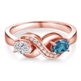 thumbnail image 2 of Gem Stone King 18K Rose Gold Plated Silver Lab Grown Diamond and London Blue Topaz and White Created Sapphire Infinity Promise Ring for Women | 1.09 Cttw | Oval 6X4MM | Gemstone Birthstone | Size 6, 2 of 5