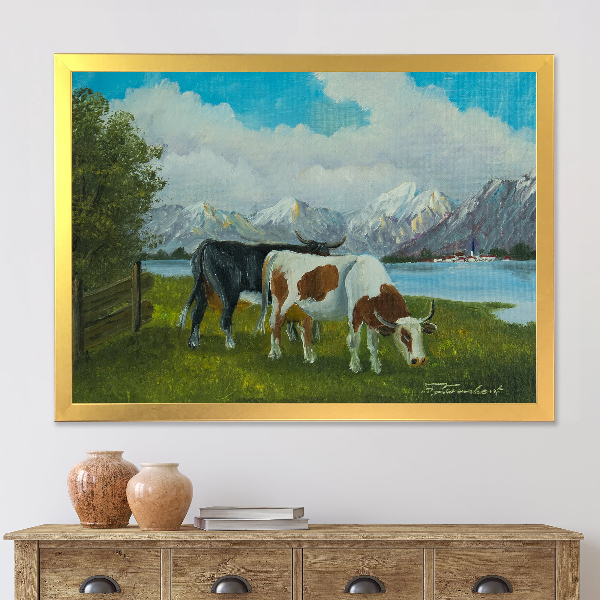 Designart 'Cows Eating Grass In Front Of A Lake' Farmhouse Framed Art Print