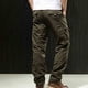 thumbnail image 4 of Pantalones largos de moda para hombre, casuales, de color sólido, con bolsillos y cremallera, cintura elástica, de poliéster., 4 of 4