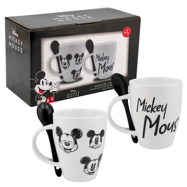 juego de 2 tazas porcelana ambient 21 diseño mickey mouse arte sketch 310 ml: dos tazas blancas de porcelana (8.5 cm de diámetro, 11 cm de alto, 310 ml) con ilustraciones tipo sketch de Mickey Mouse y una cucharita de porcelana de 12 cm en cada asa; presentadas en caja de regalo con ventana, aptas para uso diario y como regalo para fans de Disney.