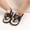 Black, variant on Floleo Unisex Baby Striped Thong Sandals Infant Soft Non-Slip Sole Shoes Adjustable Ankle Strap Pre-Walkers Summer Casual Newborn Footwear(White,0-3Months)