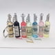 thumbnail image 2 of Llaveros de botella de vino y cerveza para hombres y mujeres, accesorios de bolsa de coche, joyería de fiesta, regalos de recuerdos de Bar, simulación de nitrógeno Turbo, 2 of 4
