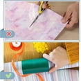 thumbnail image 3 of Nuevo cortador de papel de regalo mejorado (paquete de 2) - Papel de regalo para fiestas y cumpleaños - Estante de almacenamiento para cortadores - Dispensador con cuchilla integrada, 3 of 5