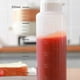 thumbnail image 2 of Bearachild Botella de condimentos Dispensador de salsas con múltiples agujeros Estuche de plástico Salsas para ensaladas Squirt Vinagre Botellas Cocina y Comedor Blanco, 2 of 6