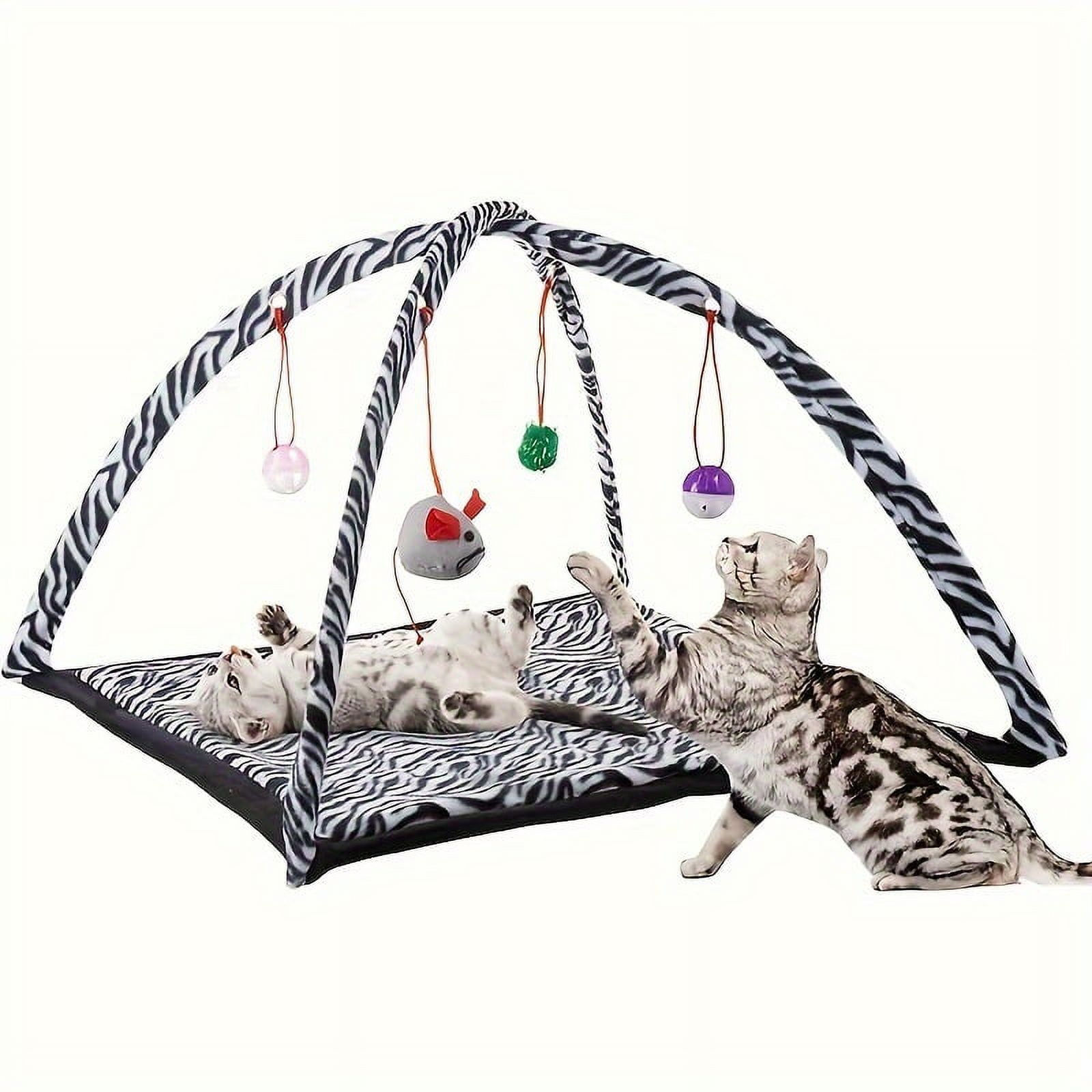 Interactive cat toy rocking activity mat for playing with cats, featuring a scratching area, hanging toys, and rolling balls