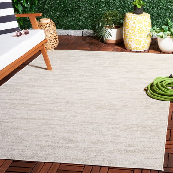 Safavieh Lakeside Zander Solid Indoor/Outdoor Area Rug, Beige, 5'3" x 7'7"