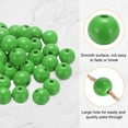 thumbnail image 4 of Uxcell 50 piezas de cuentas de madera verde profundo de 20 mm, cuentas redondas sueltas con agujero grande de 4.5 mm para joyería, collares y pulseras., 4 of 7