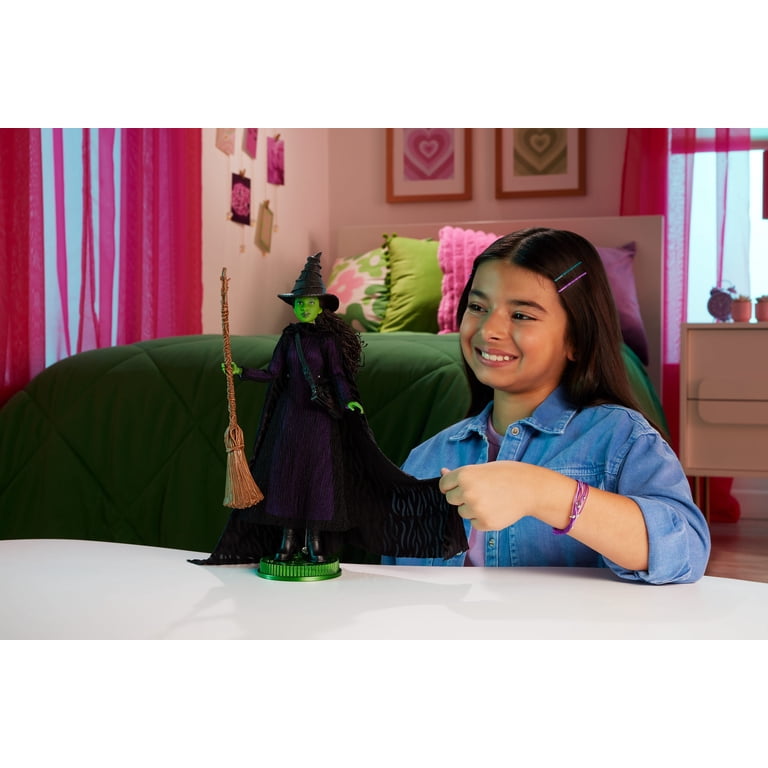 Mattel Wicked Elphaba Deluxe Fashion Doll - Movie-Inspired With Cape, Hat, Broom & 11 Points Of Articulation, Includes Stand