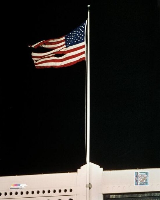 Tattered Flag from Ground Zero flying at Yankee Stadium during 2001