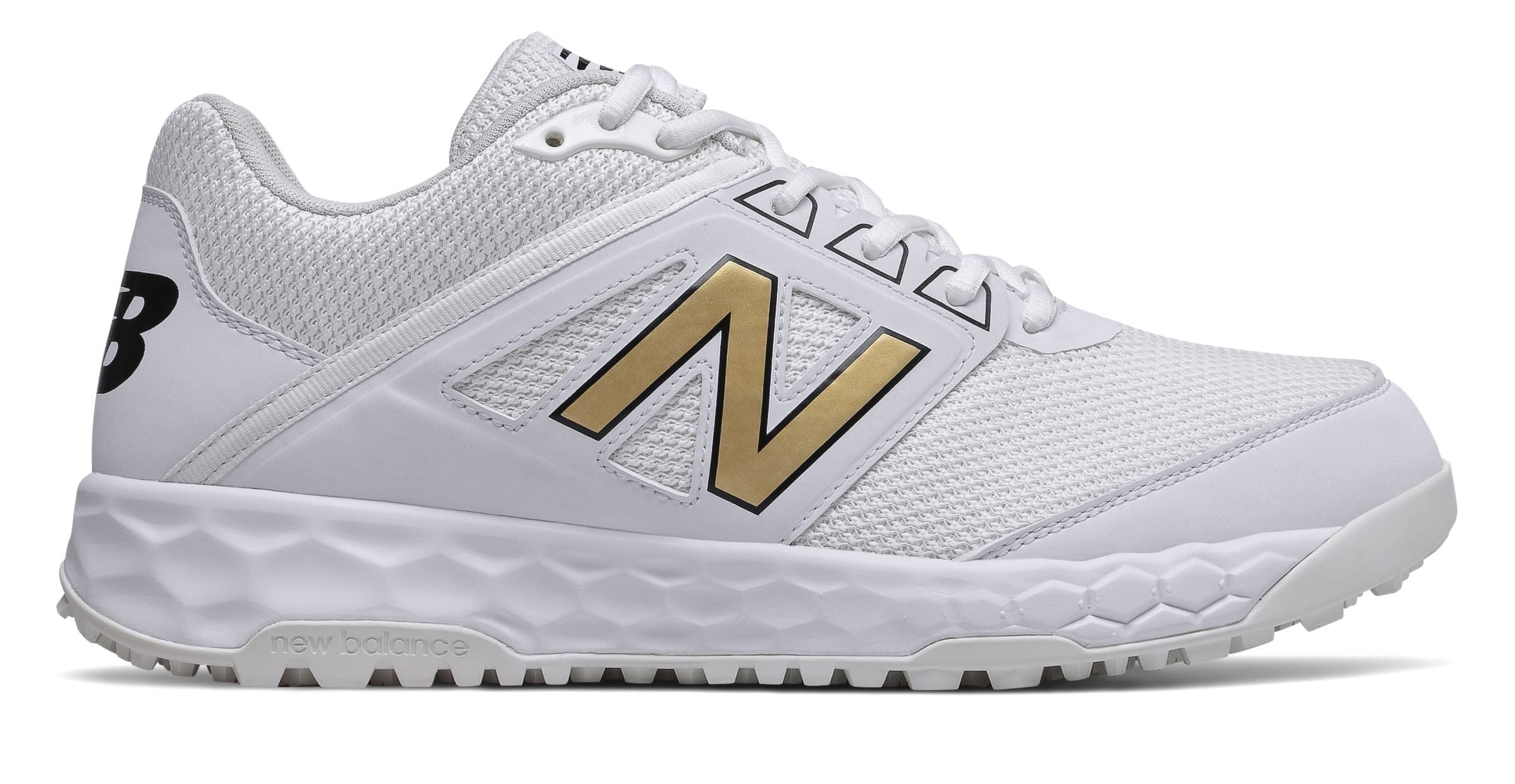 white and gold new balance baseball cleats