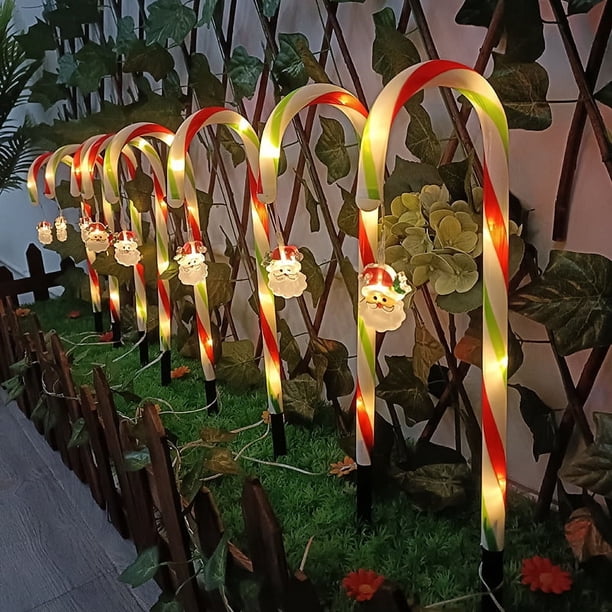 Muleta solar tricolor de Papá Noel con forma de estrella, copo de nieve, mango de paraguas, caramelo, luz LED para césped para exteriores