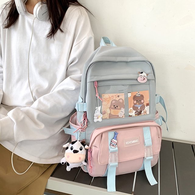 Mochila de lona con colgante para mujer, color rosa