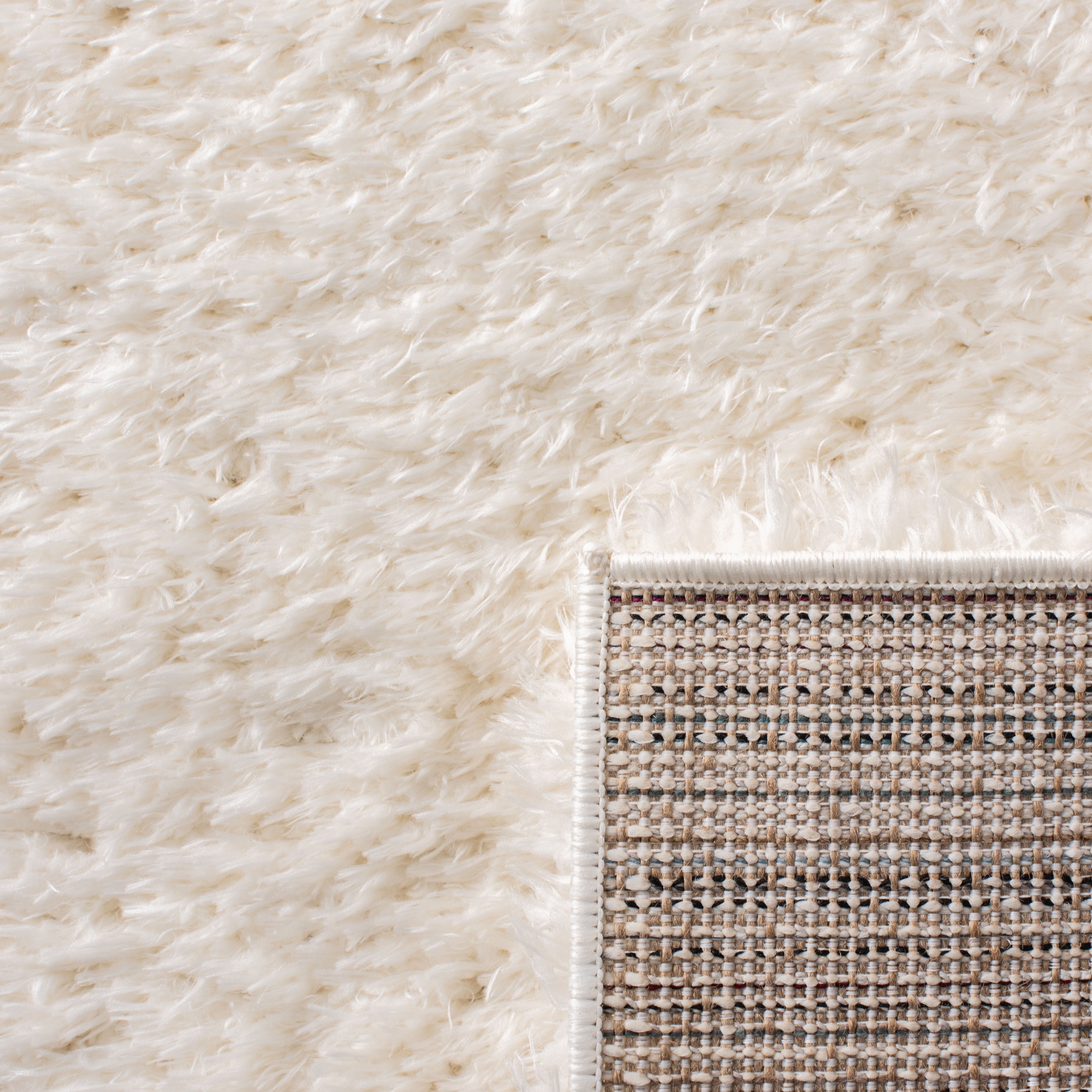 SAFAVIEH Madrid Miah Solid Polyester Shag Runner Rug, Ivory, 2' x 10'