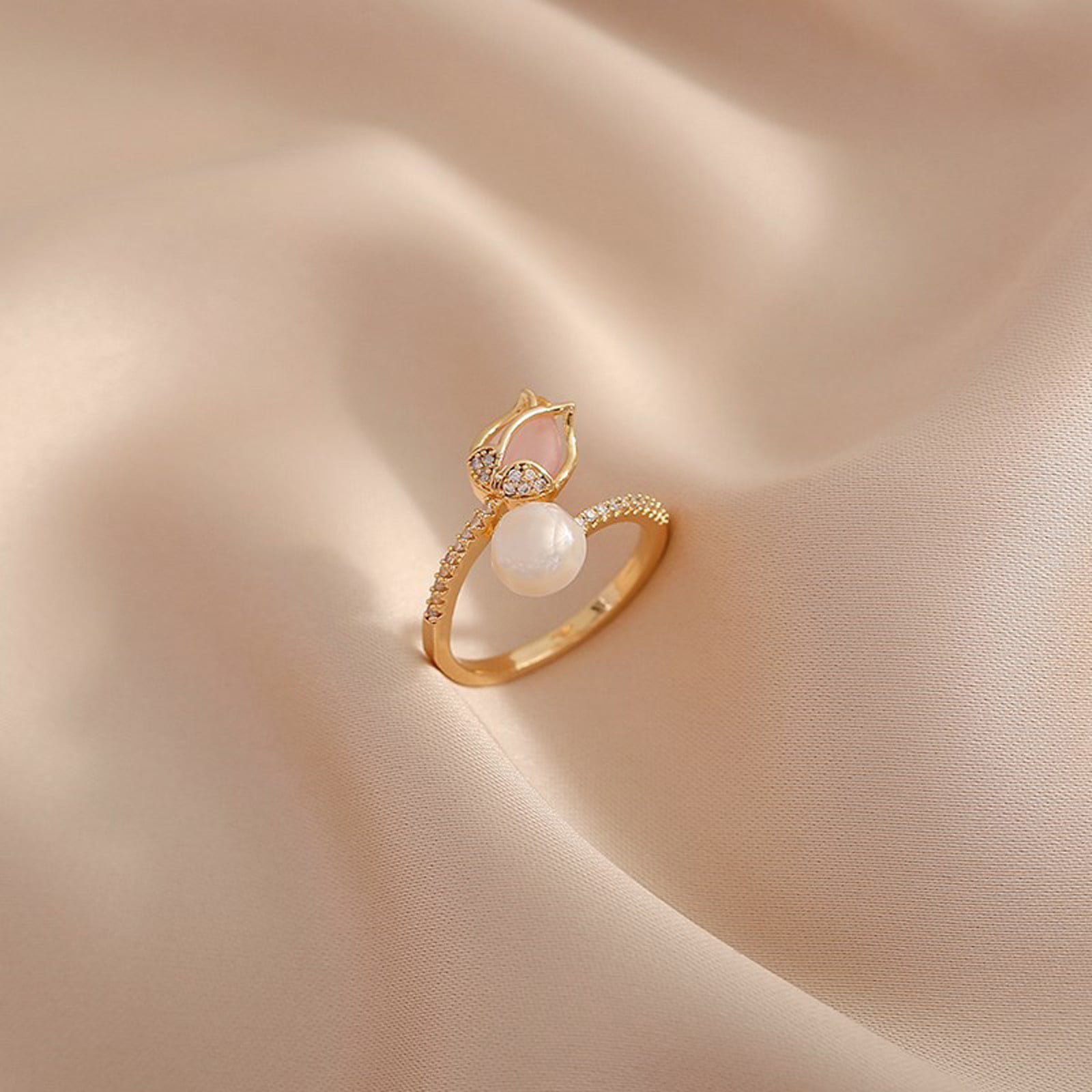 Pearl and Diamond Engagement Ring set in Gold with Diamonds