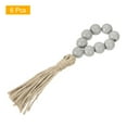 thumbnail image 3 of Uxcell 6Pcs Anillos de Servilleta de Perlas de Madera, Hebillos de Perlas de Madera de Estilo Campestre con Borlas de Cuerda de Yute (Gris), 3 of 6