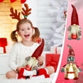 thumbnail image 1 of Fiudx Muñeco Luminoso de Papá Noel, Decoración Navideña para Mesa, Diseño de Tela Suave, Estilo Festivo Tradicional, Decoración para Fiestas, Base con Peso para Mayor Estabilidad, Tamaño 38 X 18 Cm., 1 of 3