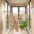 thumbnail image 7 of Portable Adjustable Clothesline, No Drill Clothes Hanger, Multi Hook System for Indoor Outdoor Use, Travel-Friendly Storage Solution, Roll-Up Design, 7 of 7