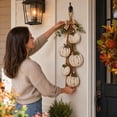 thumbnail image 5 of Distressed White Wooden Pumpkin Wall Hanging, 5‑Piece Graduated‑Size Pumpkin Swag with Plaid Bow & Eucalyptus, Farmhouse‑Inspired Seasonal Decor for Porch and Entryway, 5 of 6