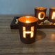 thumbnail image 3 of Juego de Porta Velas TUNC 4 Copas de Vidrio Piedras Naturales Bandeja de Madera, 3 of 5