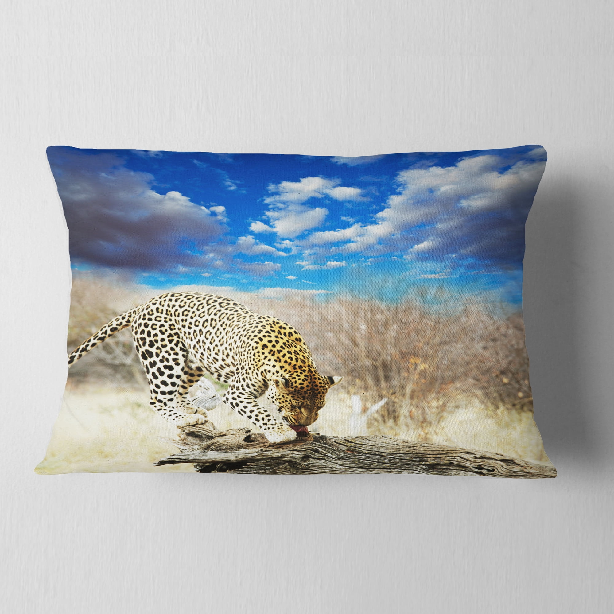 Designart Leopard Feeding on Tree Trunk - African Throw Pillow - 12x20