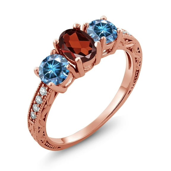 Gem Stone King 18K Rose Gold Plated Silver 3-Stone Ring Oval Red Garnet and Vivid Persian Blue Moissanite (1.99 Cttw, Size 7)