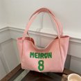 thumbnail image 4 of Bolso de lona para estudiantes, bolso de mano informal de moda de nueva tendencia 2025 para damas, bolso de tela de gran capacidad con letras, 4 of 5