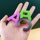 thumbnail image 5 of Juego magnético de letras y números | Imanes de nevera de alfabeto EVA multicolor | Pegatinas magnéticas duraderas y fuertes para aprender ortografía | 56 Piezas con Caja de Almacenamiento de Placa, 5 of 6