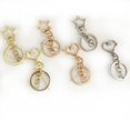 thumbnail image 2 of Juego de tres piezas de llavero con hebilla de estrella y pegamento en forma de gota, accesorios de yak con forma especial, 2 of 6