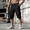 Black, variant on Mens Camo Cargo Shorts Summer Outdoor Sports Fishing Hiking Shorts Lightweight Elastic Waist Casual Short Pants Gray XL