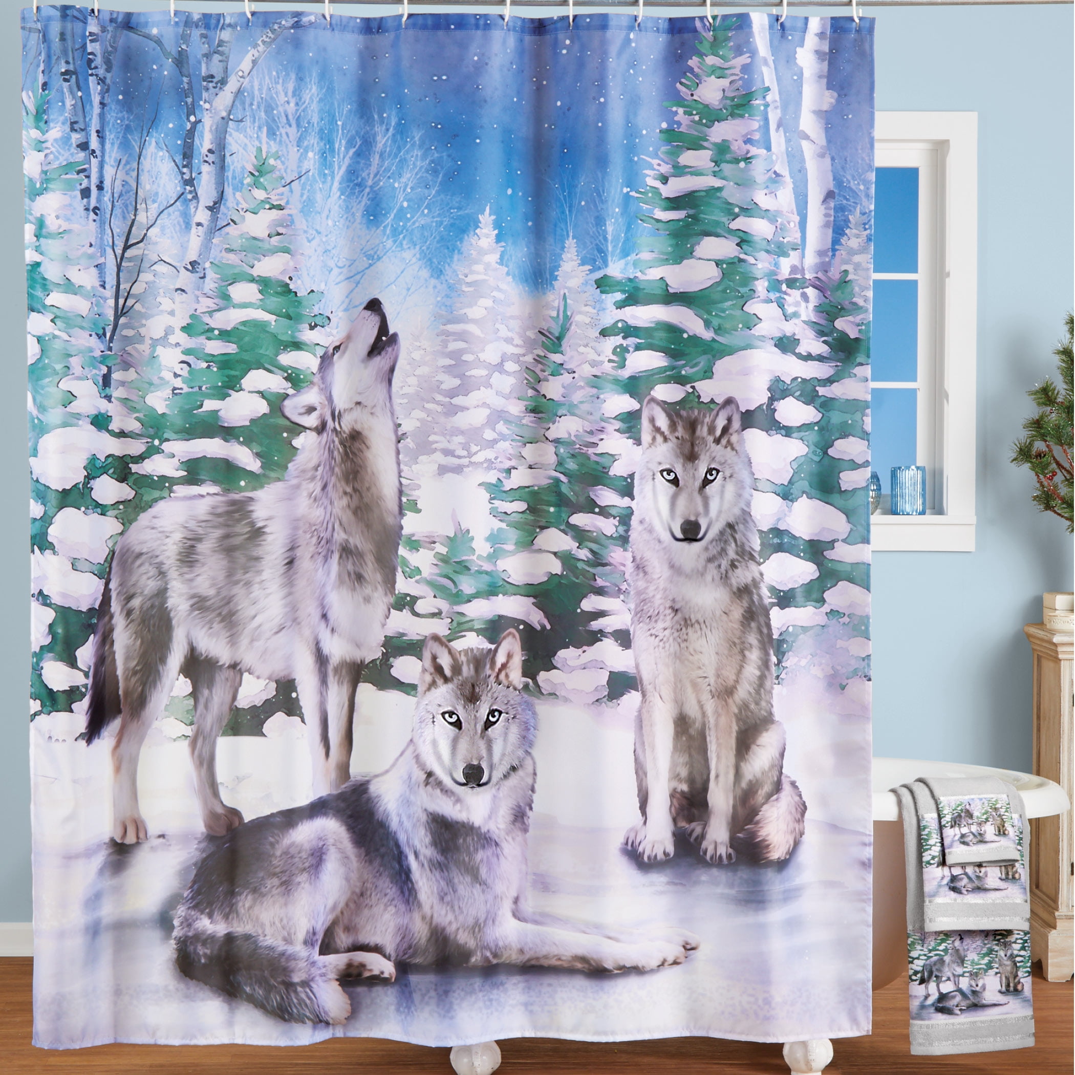 Howling Wolves Winter Forest Scene Shower Curtain features a Pack of