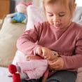 thumbnail image 2 of HABA Snug Up Doll Rumbi - 10" Soft Doll with Black Hair and Pink Overalls - Machine Washable for 18 Months and Up, 2 of 3