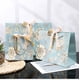thumbnail image 1 of Bolsa de embalaje de regalo con lazo festivo estilo Ins Mori, bolsa de papel portátil, bolsa de compras de ropa impresa, regalo de acompañamiento, 1 of 3