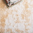 thumbnail image 6 of SAFAVIEH Rumi Derek Distressed Polyester Shag Area Rug, Gold/Ivory, 9' x 12', 6 of 7