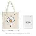 thumbnail image 3 of Stylish Canvas Tote Bag featuring a large white flower with blue accents a small figure and birds perfect for shopping and travel, 3 of 4