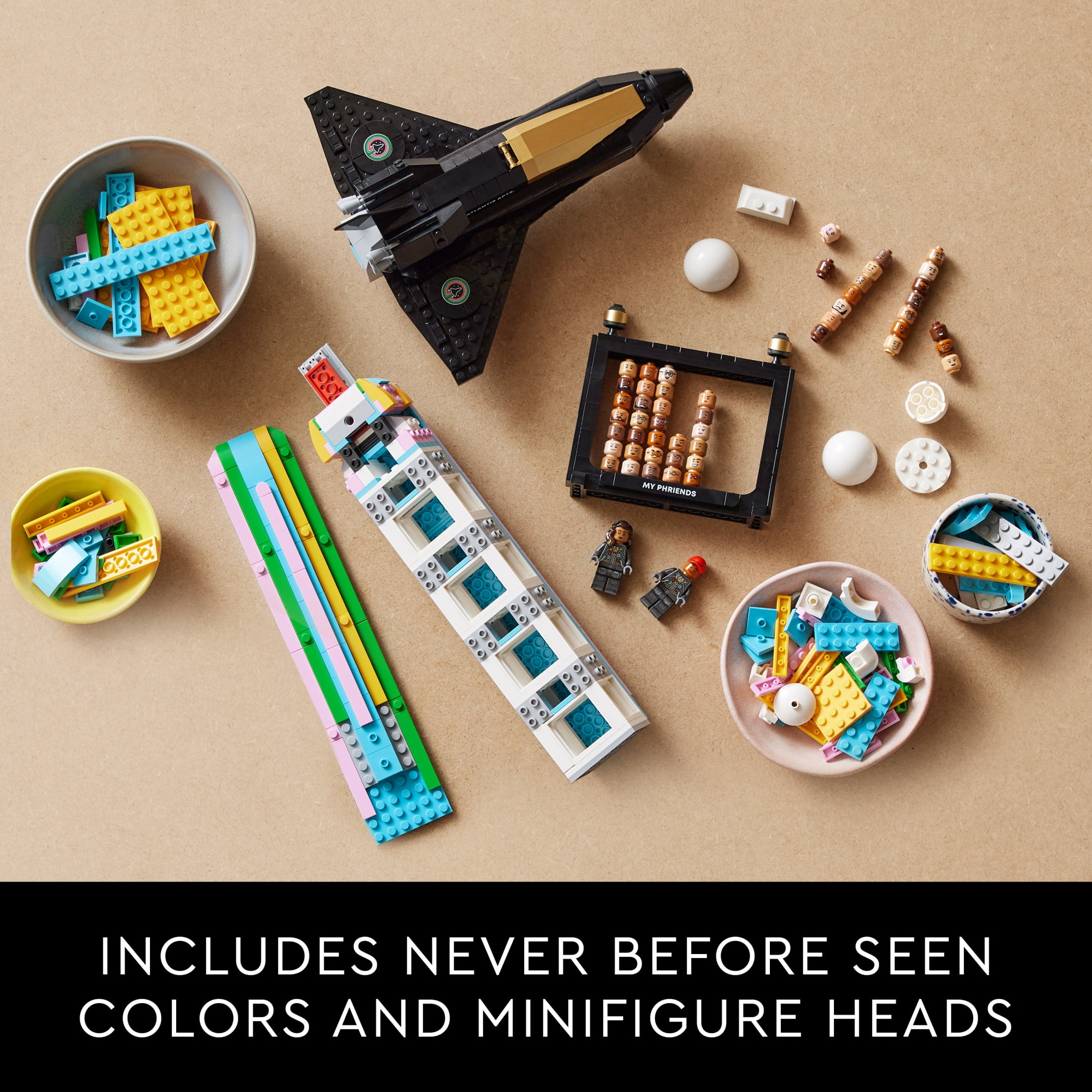 LEGO Icons Over the Moon with Pharrell Williams Set - Model Space Shuttle Building Kit - Gift for Adults - Includes Pharrell and Helen Minifigures with 49 Interchangeable Character Heads - 10391