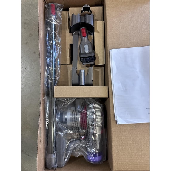 Dyson V8 Animal cordless vacuum in titanium and beige, pre-owned stick vacuum cleaner