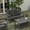 Gray, variant on Merrick Lane All-Weather Poly Resin Wood Adirondack Style Deep Seat Patio Loveseat with Cushions, Black/Charcoal