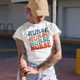 thumbnail image 2 of Nurse Word, Medical Profession Themed, Groovy Retro Wavy Text Merch Gift, Heather Grey T-Shirt, Medium, 2 of 5