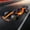 Orange, variant on Qonioi Plastic Racing Car Toy, 1:14 Inertial Sliding Car with Sound Light Effects, Friction Powered Racing Model for Collectors and Enthusiasts