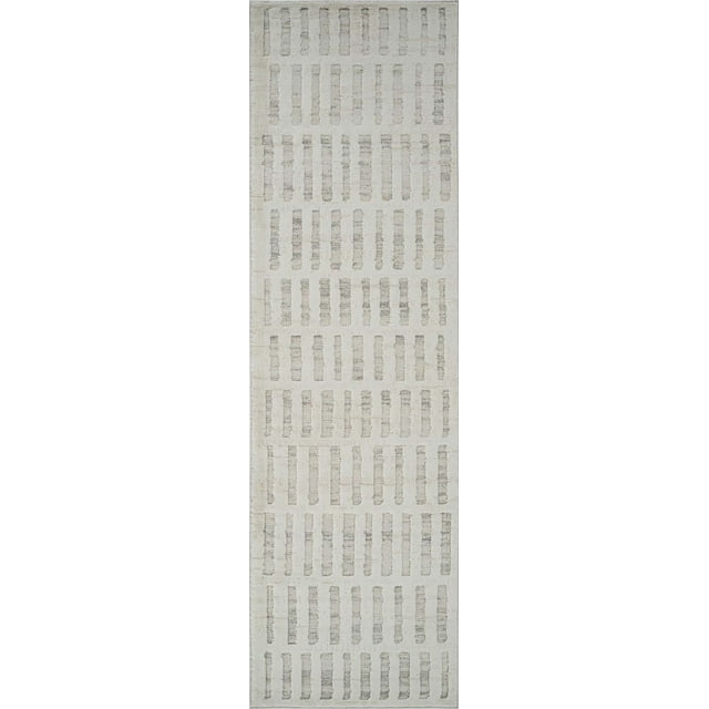Modern beige and cream indoor area rug featuring an abstract pattern of textured vertical rectangles, suitable for living room, bedroom, dining room, or kitchen.