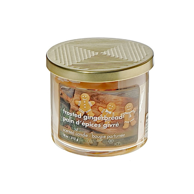14 oz 3 wick frosted gingerbread scented jar candle with gold metal lid, labeled with smiling gingerbread men illustration