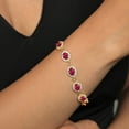 thumbnail image 3 of Gem Stone King 18K Yellow Gold Plated Silver Red Ruby Tennis Bracelet for Women (13.08 Cttw, Gemstone July Birthstone, Oval 7X5MM, 7.5 inch), 3 of 3