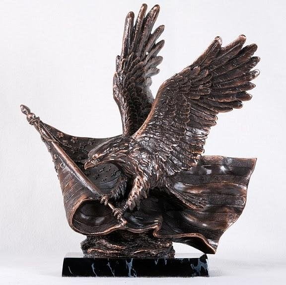 Bronzed Bald Eagle Holding American Flag with Wings Outspread Statue