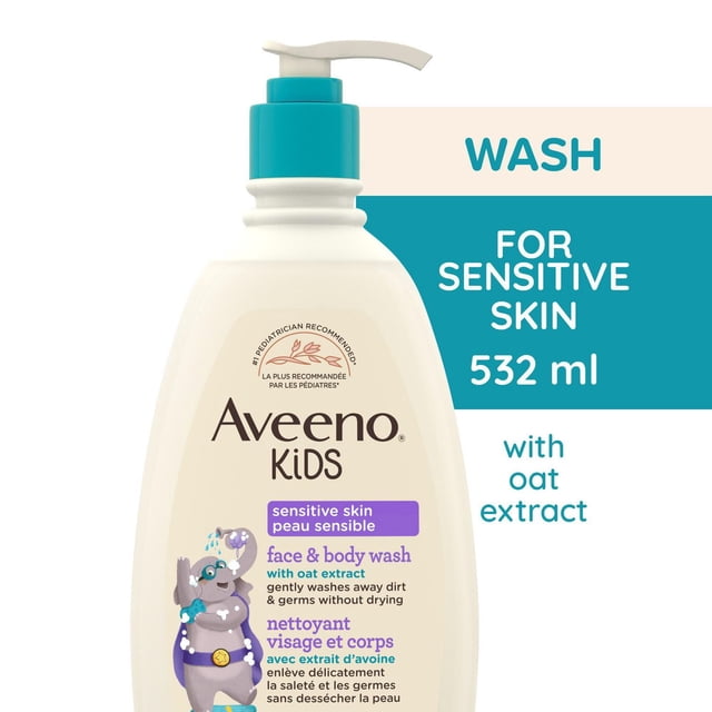 Aveeno Kids Face & Body Wash 532 ml bottle with teal pump, hypoallergenic and tear-free formula with oat extract for sensitive skin, featuring a cartoon bear on the label, gently cleanses face and body without drying.