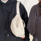 thumbnail image 5 of Bolsa de pecho de lona bandolera para hombre y mujer | Mochila bandolera de gran capacidad | Correa ajustable | Multibolsillo Viajes, Ciclismo, Exterior, Uso Casual | 33x16x9cm | 1 pieza | Blanco, 5 of 6