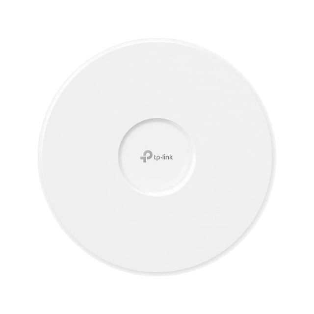 punto de acceso inalámbrico tp-link omada eap773 be11000 vista cenital de disco blanco con logo TP-Link en el centro; diseño circular plano y acabado mate, montaje en techo visible por el hueco central, compatible con Wi‑Fi 7 tri‑banda BE11000 y puerto 10G según especificaciones, también adecuado para oficinas pequeñas o salas de reuniones.