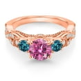 thumbnail image 2 of Gem Stone King 18K Rose Gold Plated Silver Pink Moissanite London Blue Topaz and White Moissanite Engagement Ring for Women (1.33 Cttw, Gemstone, Round 6MM and 3MM, Size 6), 2 of 4